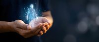 Hands holding glowing digital human figure with network connections representing healthcare technology, artificial intelligence in medicine, and futuristic medical innovation.