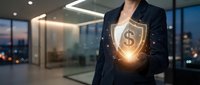 Professional businesswoman holding glowing dollar shield symbol representing financial security and investment protection in modern office.