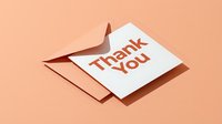 Thank you card with envelope on pastel peach background, modern minimalist greeting card design for appreciation and gratitude messages.