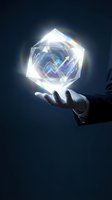 Hand holding glowing geometric crystal orb with upward trending arrow chart inside, symbolizing financial growth, investment success, and business innovation on dark background.