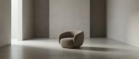 Curved upholstered armchair in neutral beige tone positioned in minimalist interior space with striped wall panels and polished concrete floor, suitable for furniture design and interior decoration projects.