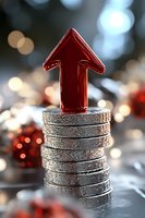 Red upward arrow on stack of silver coins against blurred bokeh background, symbolizing financial growth and investment success. Macro photography with selective focus.