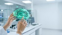 Medical professional examining holographic brain model in modern laboratory for neuroscience research and healthcare technology applications.