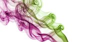 Colorful smoke swirls in purple and green creating abstract flowing patterns on white background for creative design projects.