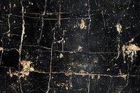 Dark grunge wall texture with cracked black paint and exposed beige patches, creating abstract pattern of weathered surface, suitable for vintage design backgrounds.