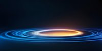 Glowing spiral rings in blue and orange colors against dark background create futuristic cosmic portal effect with dynamic light trails and motion blur.