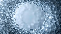 Crushed ice cubes arranged in circular frame with blurred winter background, suitable for beverage, cooling, and refrigeration concepts.