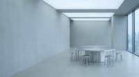 Modern minimalist conference room with round table and metal stools in empty concrete space with skylight, suitable for corporate and architectural visualization projects.