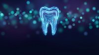 Glowing blue tooth hologram with digital bokeh lights on dark background for dental technology and healthcare innovation concepts.