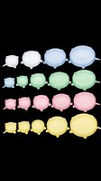 Colorful silicone stretch lids set in multiple sizes, isolated on transparent background. Great for stickers, print on demand, clipart, and T-shirt design use.