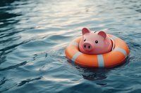 Pink piggy bank floating on orange lifebuoy in rippling blue water, symbolizing financial security and emergency savings concept for banking and insurance.