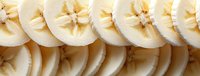 Sliced apple and pear arranged in overlapping rows, showcasing fresh fruit texture and natural pale tones for food styling, culinary content, and healthy eating concepts.