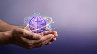 Hands holding glowing purple globe with network connections and sparkles on gradient background for global business and technology concepts.