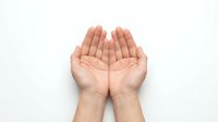 Open cupped hands gesture on white background showing palms up in receiving or giving position for prayer, charity, offering concepts.