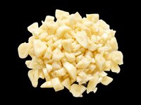 Diced white cheese cubes isolated on transparent background, ready for culinary design, food packaging, recipe graphics, cooking blogs, restaurant menus, and print-on-demand food products.