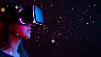 Young woman wearing VR headset exploring virtual reality space with glowing particles and stars in futuristic digital environment for gaming and technology.
