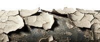 Cracked and parched earth with deep fissures and peeling soil layers, depicting severe drought, desertification, and environmental degradation for climate change awareness.