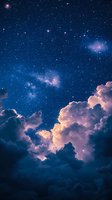 Dramatic night sky with illuminated pink clouds and bright stars in deep blue space, creating ethereal atmosphere for spiritual and astronomical designs.