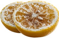Fresh cut lemon halves covered in crystallized sugar creating sparkly frost effect on citrus fruit segments, isolated on white background for food styling.