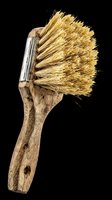 Worn wooden brush with natural bristles isolated on transparent background, ready for clipart, t-shirt design, print-on-demand products, stickers, and sublimation projects.