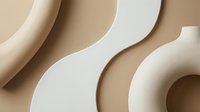 Abstract flowing curves in warm beige and cream tones creating elegant waves and organic shapes for modern minimalist design backgrounds.
