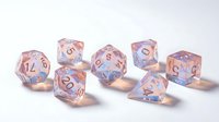 Set of translucent pink and blue polyhedral gaming dice with copper numbers on white background for tabletop RPG games and board game accessories.