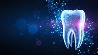 Futuristic digital tooth with glowing particles and network connections on dark blue background for dental technology and healthcare innovation concepts.