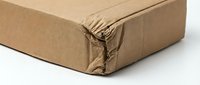 Damaged brown cardboard shipping box with torn corner showing wear from handling and transportation mishaps.