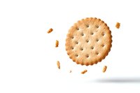 Round crispy cracker with holes and scattered crumbs floating on white background, isolated food photography for commercial and packaging design use.