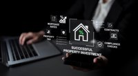 Professional businessman using laptop with digital real estate investment icons and property management interface for financial planning.