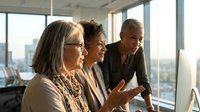 Diverse group of mature professionals discussing business strategy in modern office with city skyline view through windows, suitable for corporate, leadership, and teamwork concepts.