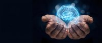Hands holding glowing digital brain representing artificial intelligence, technology innovation, and smart solutions for business and future computing concepts.
