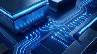 Close-up of glowing blue circuit pathways on microchip with illuminated electronic components and data flow lines for technology, computing, and digital innovation concepts.