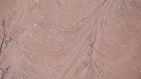 Fluid marbled texture with swirling patterns and sparkle accents on dusty rose background, suitable for wallpaper and design projects.