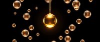 Golden spheres floating in dark space with warm glowing light effects creating luxurious abstract background for premium design projects.