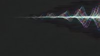 Digital sound wave visualization with colorful frequency spectrum on dark background for audio technology and music production applications.