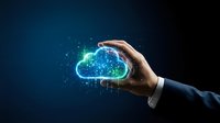 Businessman hand protecting glowing digital cloud computing network with data connections and particles on dark blue technology background.