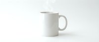 White ceramic coffee mug isolated on clean background for mockup design and branding projects.