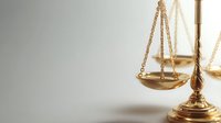 Golden scales of justice on neutral background symbolizing law, legal system, court proceedings, attorney services, and judicial balance for professional use.