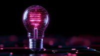 Glowing light bulb with pink and purple neon illumination against dark background, creative energy concept with bokeh effect and reflection.