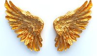 Majestic golden angel wings with detailed feathers and intricate layered design on white background, isolated decorative element for creative projects.