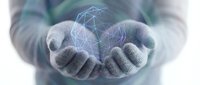 Hands holding glowing blue geometric network sphere representing digital connectivity, technology innovation, and data visualization for business presentations.