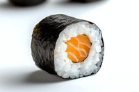 Fresh salmon maki sushi roll with rice and nori seaweed on white background, close-up view showing texture and ingredients for food photography.