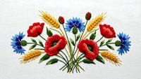 Embroidered floral bouquet with red poppies, blue cornflowers and golden wheat ears on white fabric. Traditional folk art needlework design for textile.