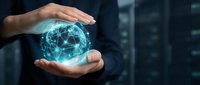 Businessman hands protecting glowing digital globe with network connections in modern data center environment for technology and cybersecurity concepts.
