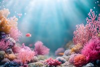 Vibrant underwater scene with pink and orange coral reef formations, small tropical fish swimming among soft corals in turquoise blue water with rays of light.