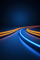 Glowing curved light trails in orange and blue neon colors against dark background create dynamic motion effect, suitable for technology and future concepts.