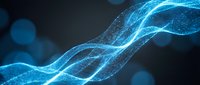 Abstract blue energy waves flowing with glowing particles and bokeh effects on dark background for digital technology and futuristic design concepts.