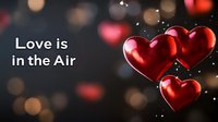 Red heart balloons floating against dark bokeh background with romantic text. Valentines day celebration concept with glowing sparkles and dreamy atmosphere.