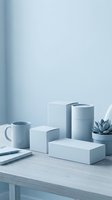Minimalist blue monochrome product display with geometric boxes, cylinder, mug and succulent plant on wooden table for branding mockup and packaging design.
